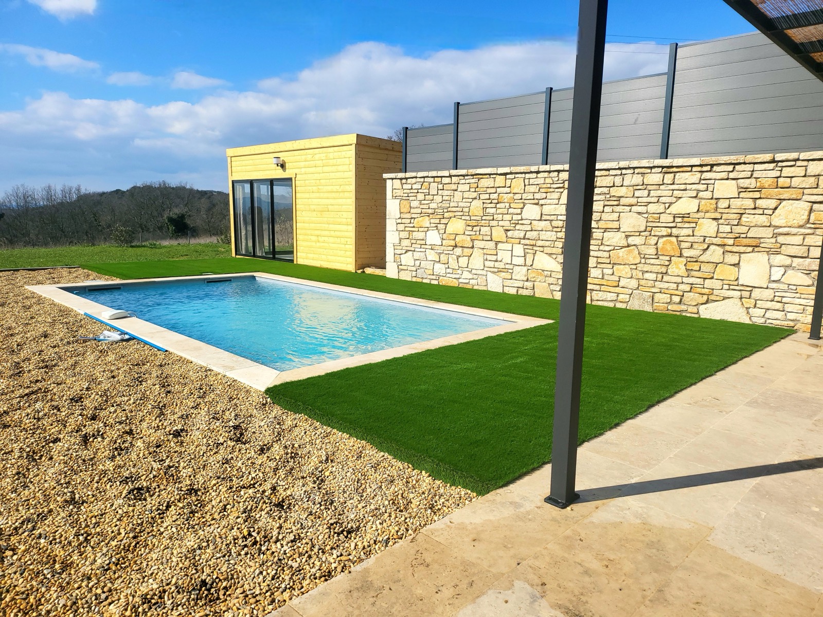 Pool and chalet during the day