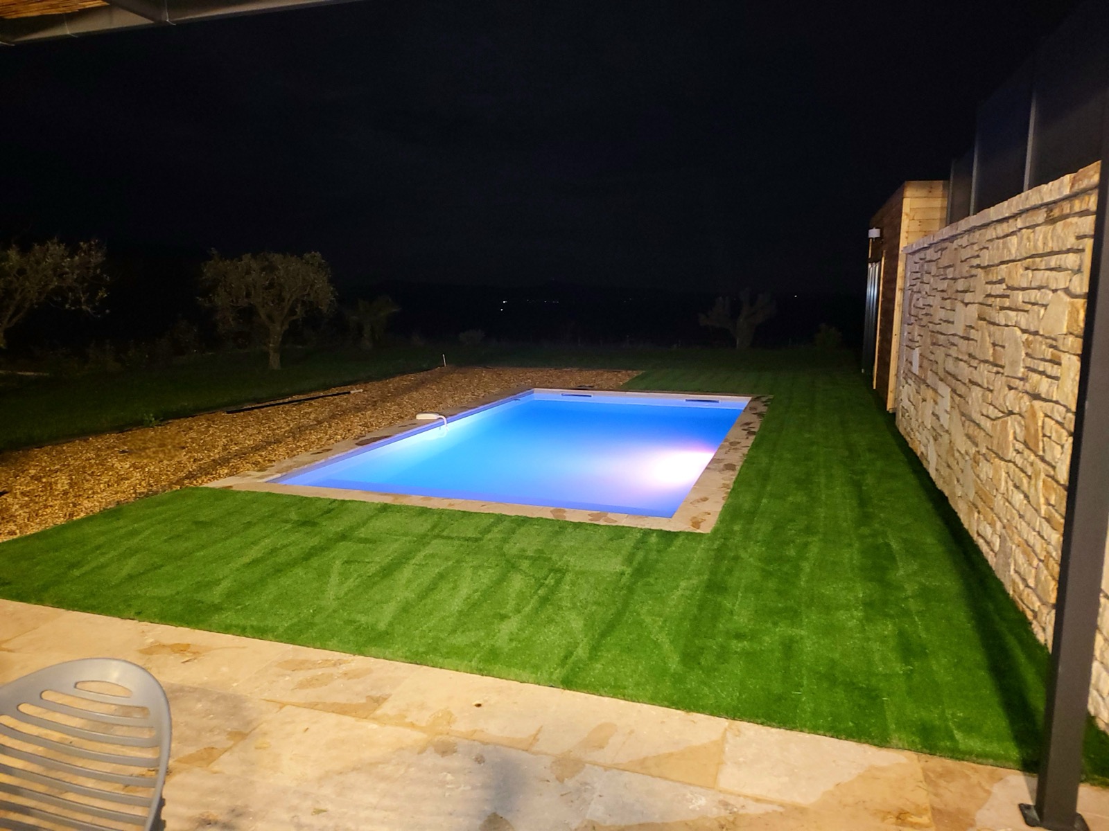 Pool lit up at night