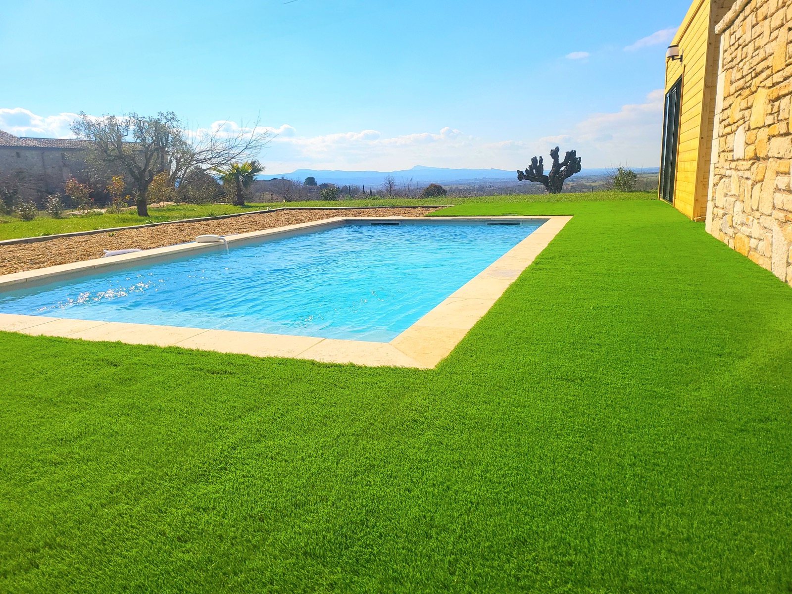 Romantic pool at sunset with candles